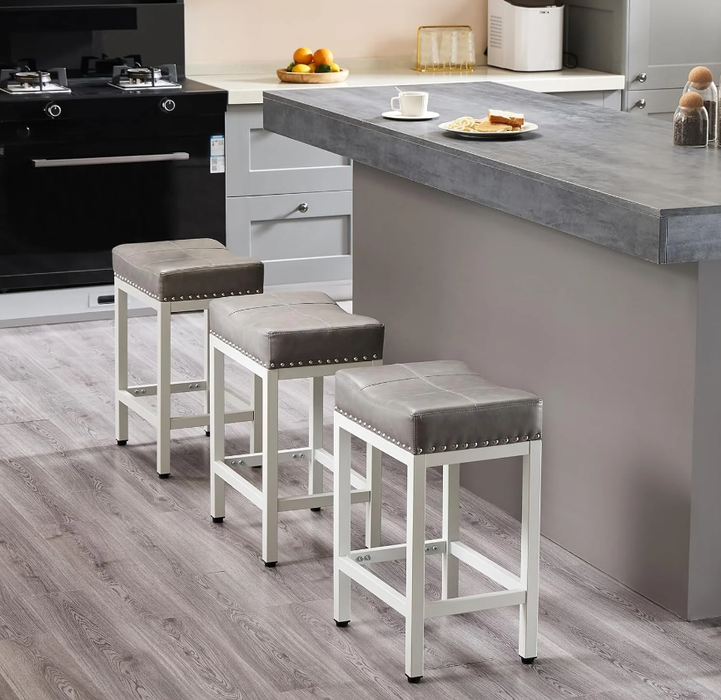 TINKLE WELL Bar Stools Counter Height - 24 Inch Saddle Stools, PU Leather Modern Kitchen Barstools with Metal Base Footrest