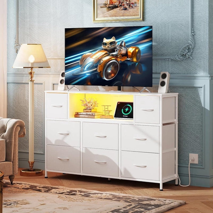 Nextay LED TV Stand with Charging Station, Music-Sync Light Up Entertainment Center, 8 Fabric Drawer Dresser for Bedroom & Living Room, White(Fits 45-55 inch TV)